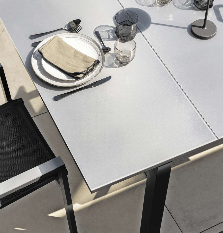 Odyssea table, 188/244 x 100 mm, aluminium frame with anthracite Naterial glass top