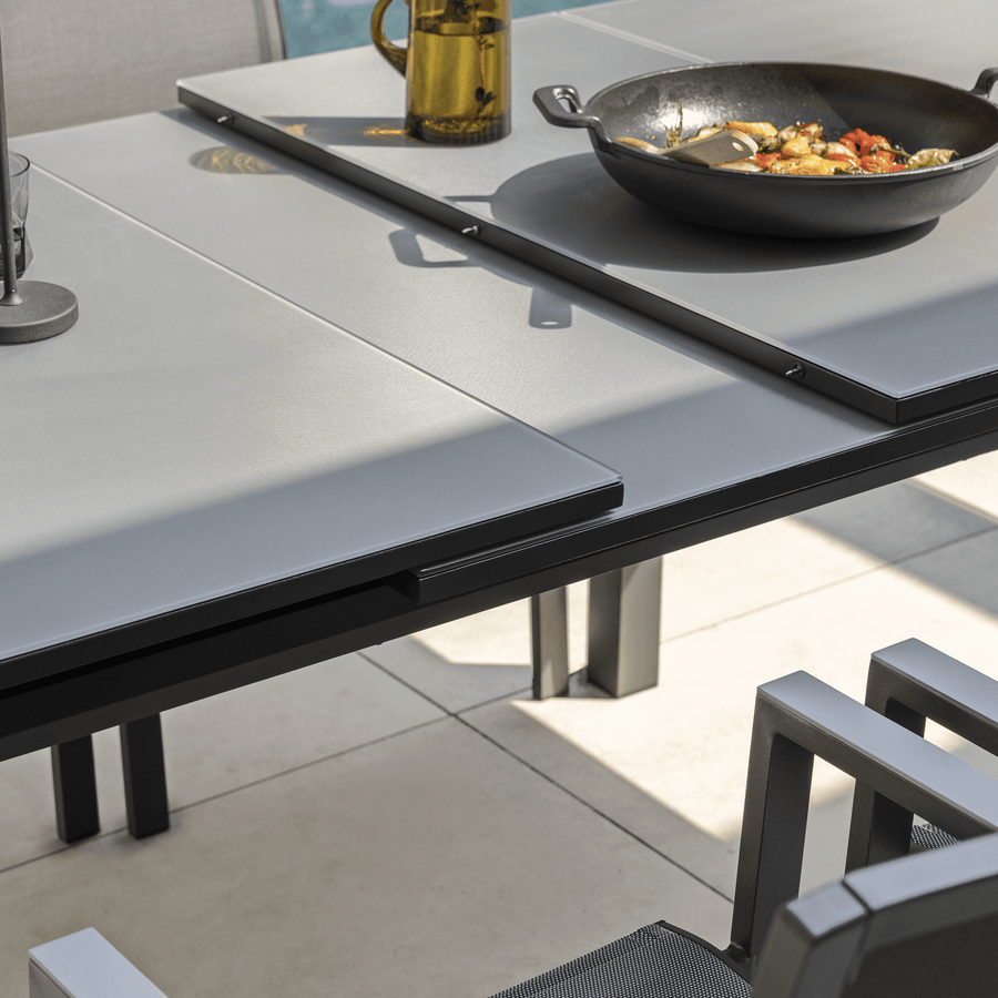 Odyssea table, 188/244 x 100 mm, aluminium frame with anthracite Naterial glass top