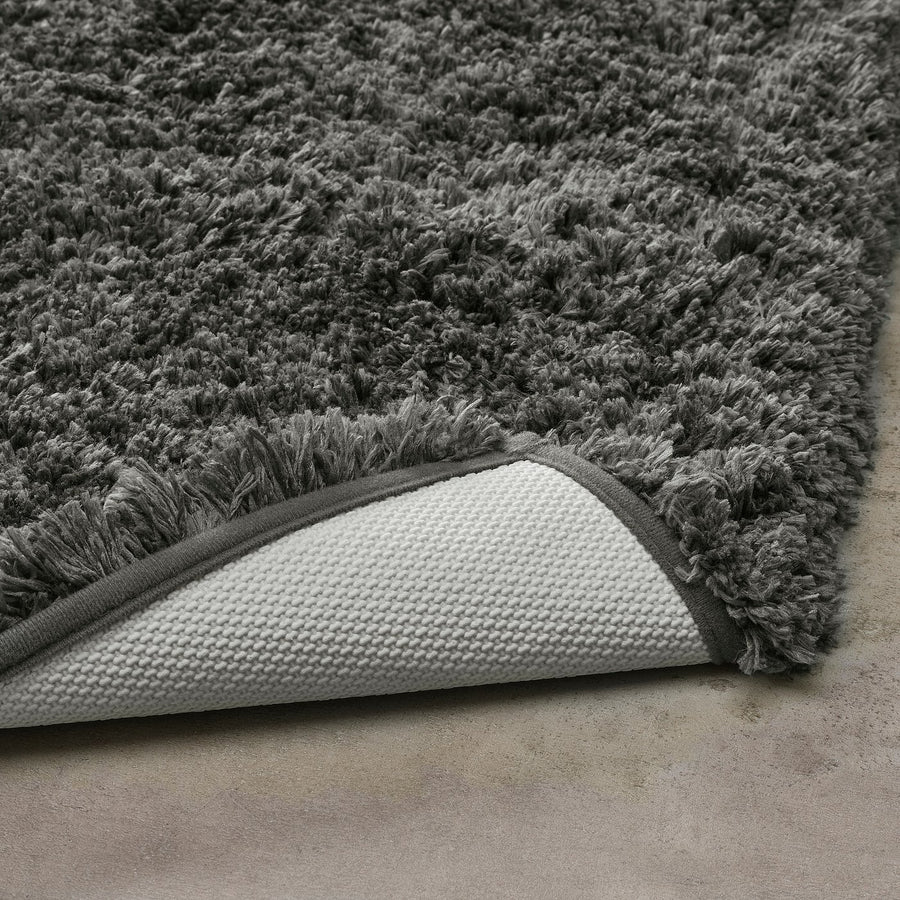 ALMTJÄRN bath mat, dark grey, 90x60 cm