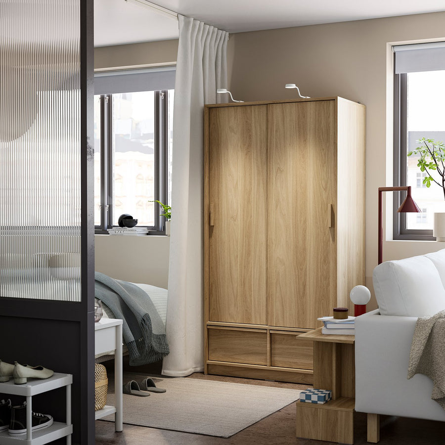 ANKARUDDEN wardrobe with sliding doors, oak effect, 98x60x190 cm