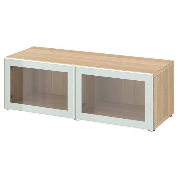 BESTÅ shelf unit with glass doors, white stained oak effect Glassvik/white/light green clear glass, 120x42x38 cm