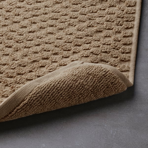 FJÄLLKATTFOT bath mat, beige, 50x80 cm