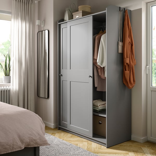 HAUGA wardrobe with sliding doors, grey, 118x55x199 cm