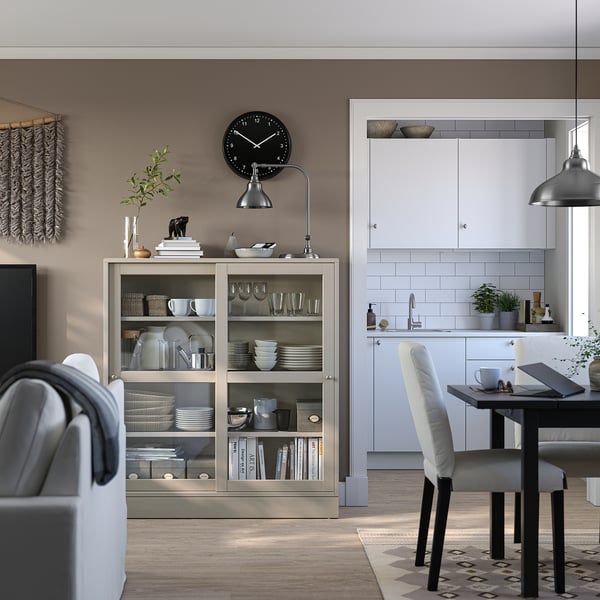 HAVSTA glass-door cabinet with plinth, grey-beige/clear glass, 121x37x134 cm