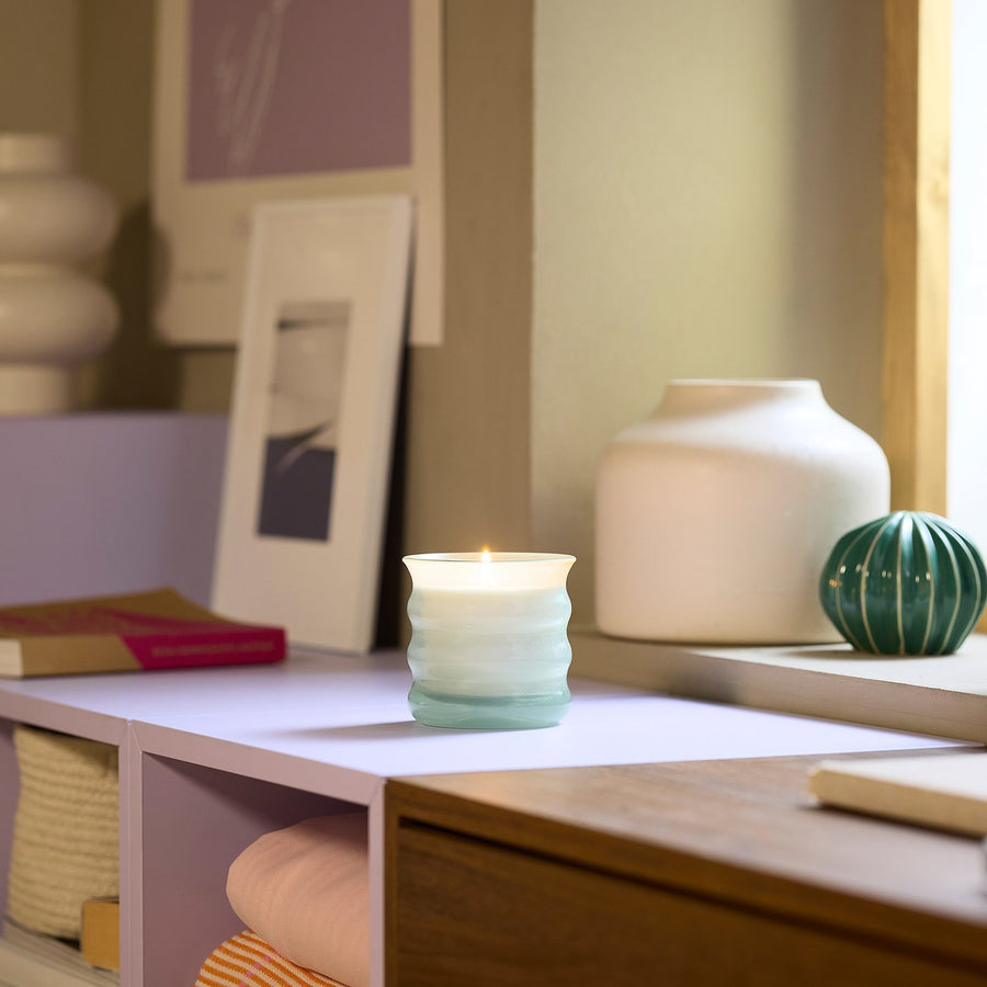 JUVELTRAST scented candle in glass, Apple light green, 10 cm