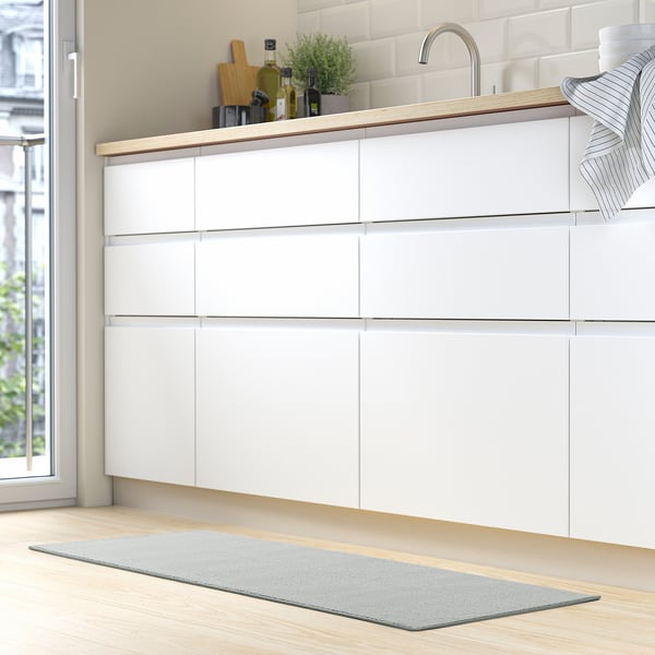 KÖRFÄLT kitchen mat, light grey, 45x120 cm