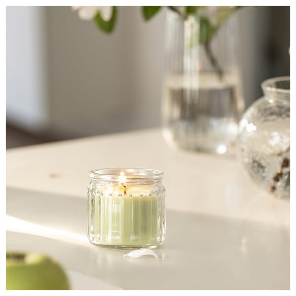 LÖVSKOGSLUND scented candle in glass, Apple/light green, 12 h