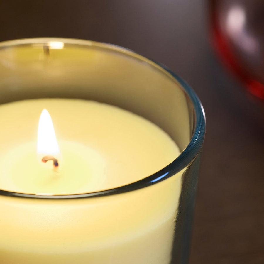 LOTSFÅGEL scented candle in glass, Citrus flower light yellow, 20 hr