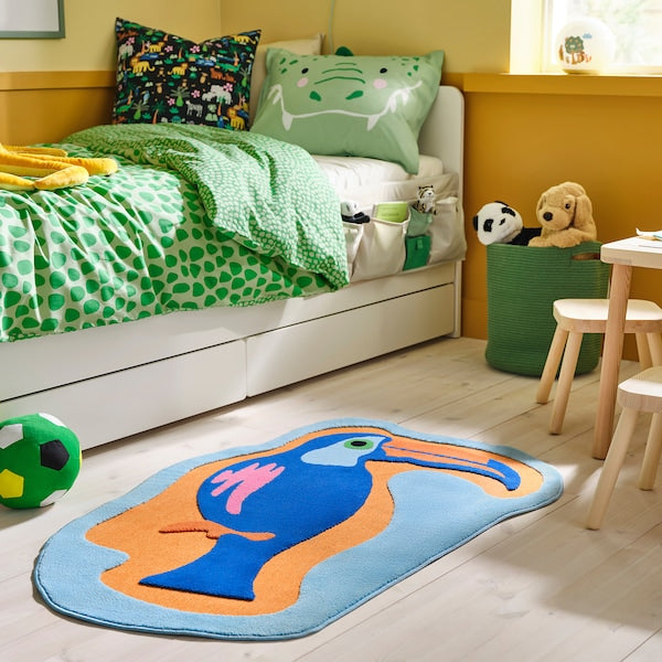 NATTHÄGER rug, low pile, blue orange/toucan, 83x125 cm