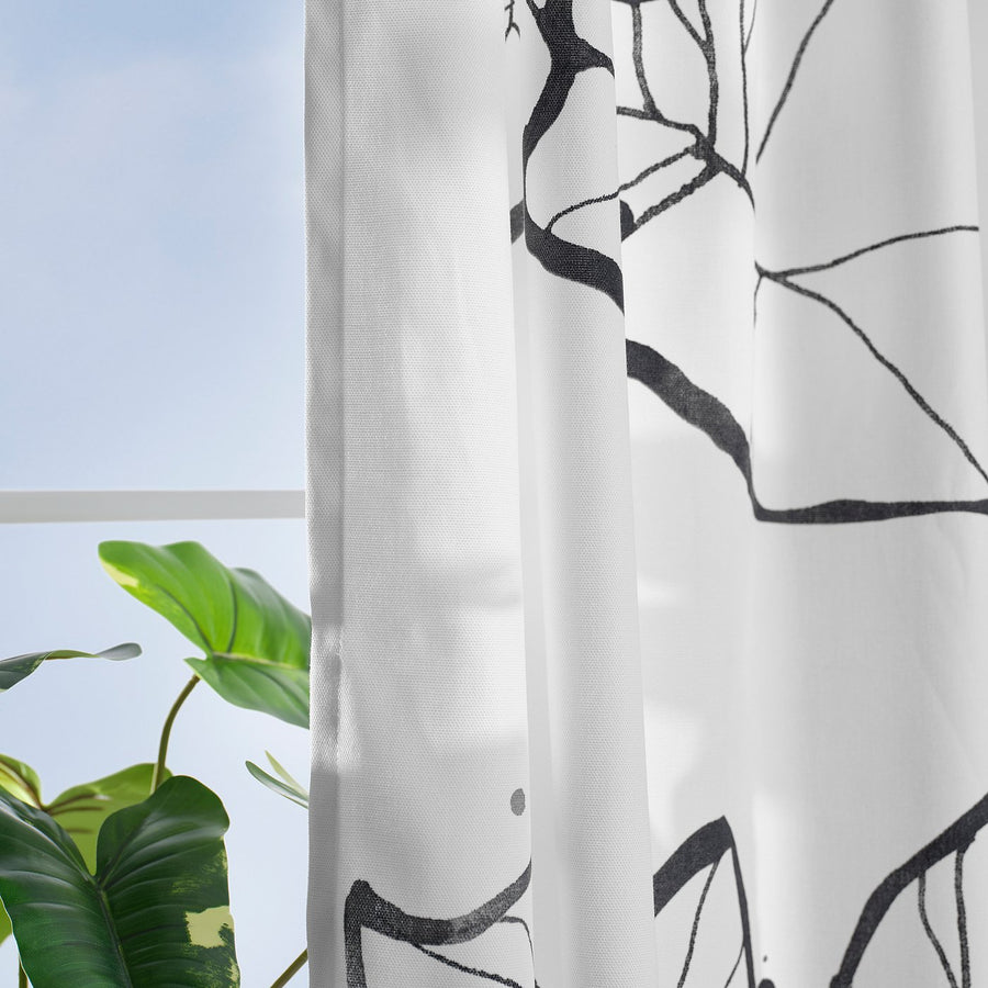 PELARKÖRSBÄR curtains, 1 pair, white/black floral pattern/with heading tape, 300x145 cm