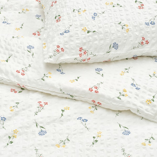 PILDVÄRGMAL duvet cover and pillowcase, white/floral pattern, 150x200/50x80 cm
