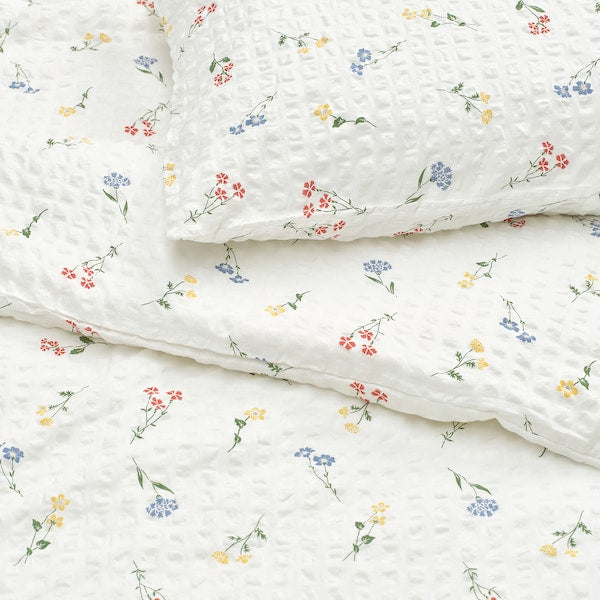 PILDVÄRGMAL duvet cover and pillowcase, white/floral pattern, 150x200/50x80 cm