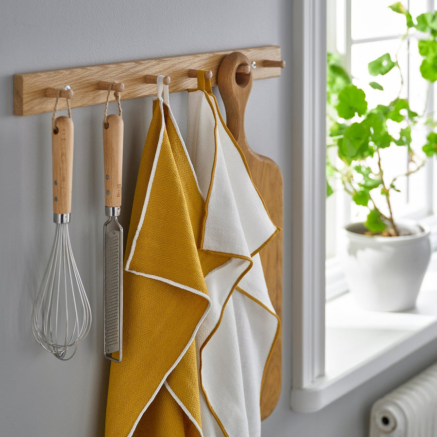 SANDABBORRE tea towel, white/dark yellow, 50x50 cm, 2 pack