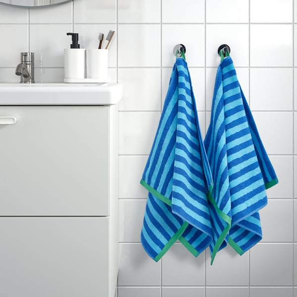 SLÅNHÖSTMAL hand towel, bright blue/light blue striped, 50x100 cm
