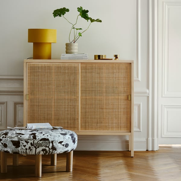 STOCKHOLM 2025 cabinet with sliding doors, rattan/pine, 125x47x110 cm