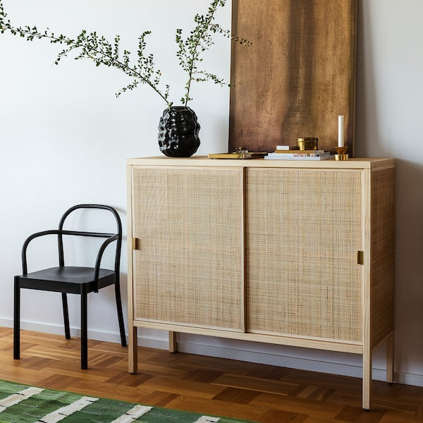 STOCKHOLM 2025 cabinet with sliding doors, rattan/pine, 125x47x110 cm