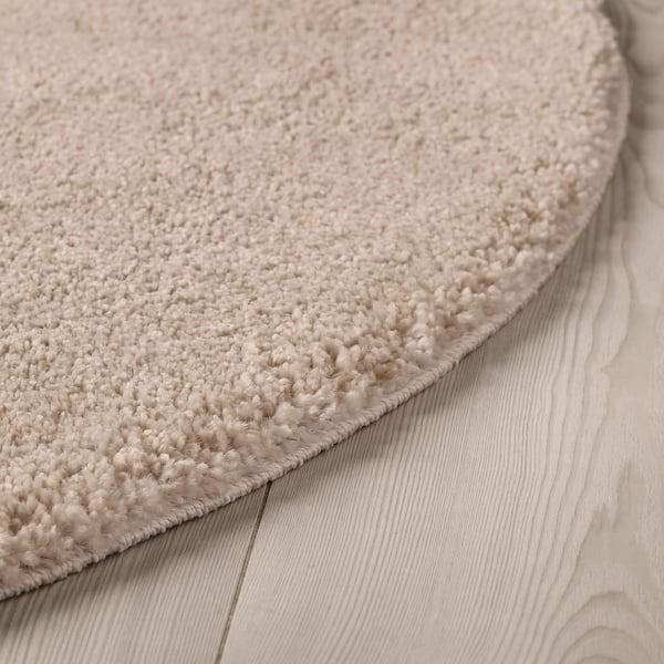STOENSE rug, low pile, off-white, 130 cm