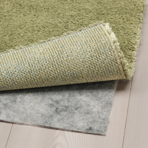 STOENSE rug, low pile, light olive-green