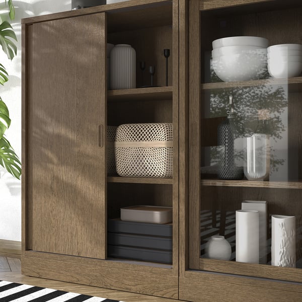 TONSTAD storage combination w sliding doors, brown stained oak veneer/clear glass, 202x37x120 cm