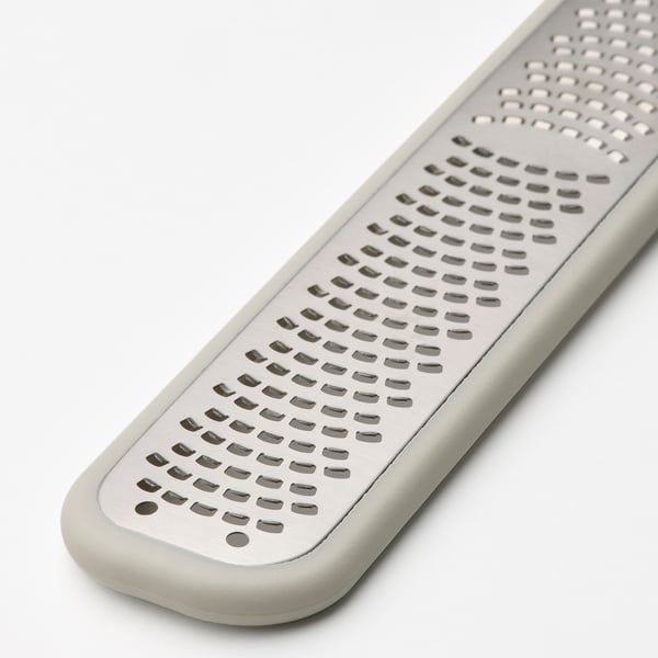 UPPFYLLD handheld grater, off-white, 23x4 cm