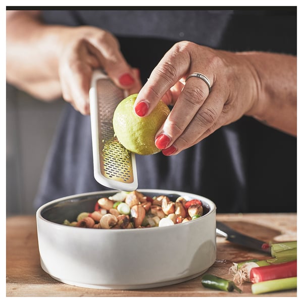 UPPFYLLD handheld grater, off-white, 23x4 cm