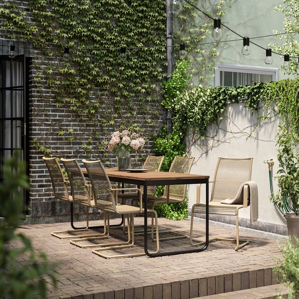 VÄSMAN / VÄSMAN table+6 chairs w armrests, outdoor, extendable light brown stained/brown, 135x190/74 cm