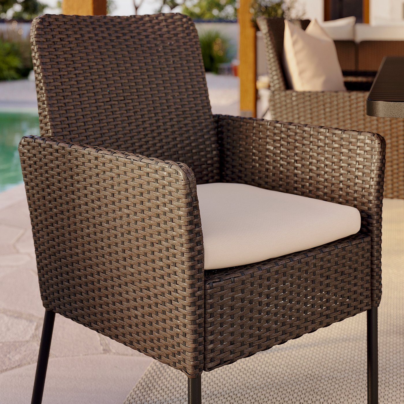 VITTSKÄR chair with armrests, plastic rattan outdoor/dark grey, 50x95x64 cm
