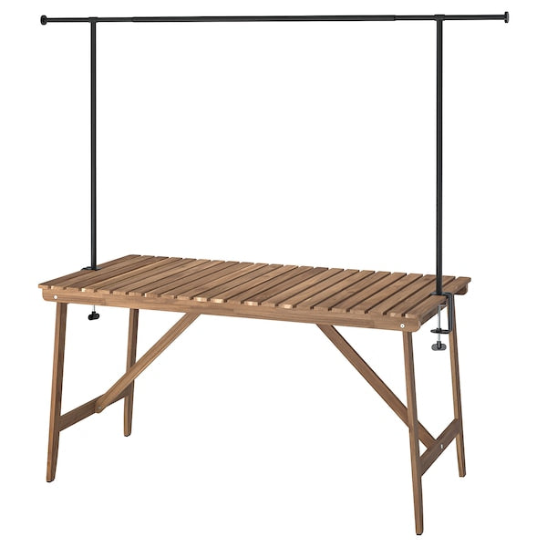 ASKHOLMEN / HELGEÖ - Table with decorating rod, outdoor dark brown/black, 143 cm