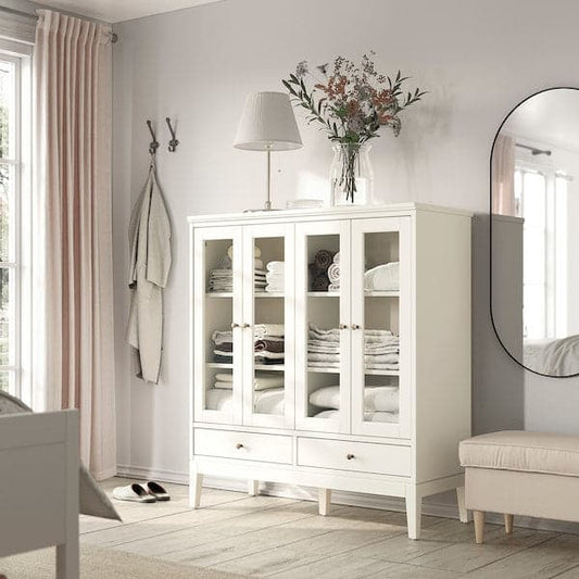 Ikea IDANÄS - Cabinet with bi-folded glass doors, white, 121x50x135 cm