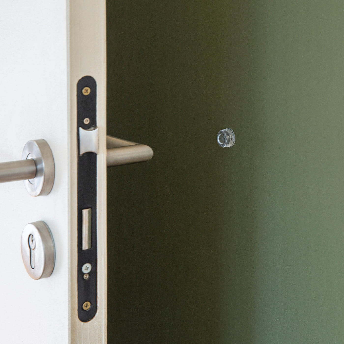 CLEAR PVC ADHESIVE DOORSTOP OP