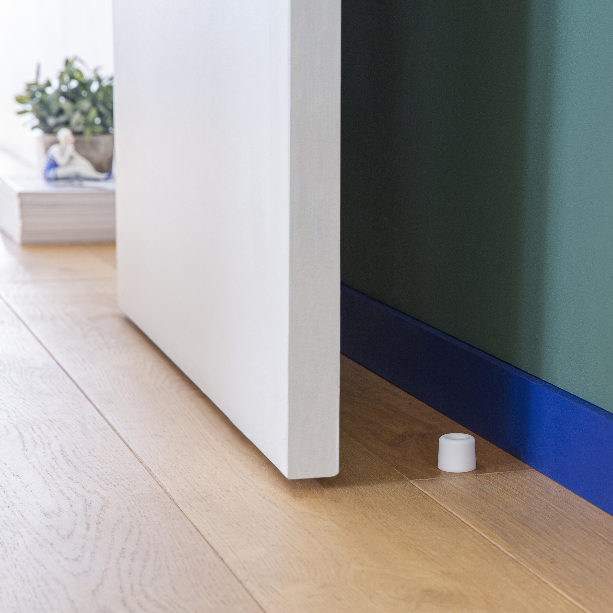 VULCANISED RUBBER DOORSTOP WITH DOUBLE FASTENING WHITE D 3 X H 2.5 CM