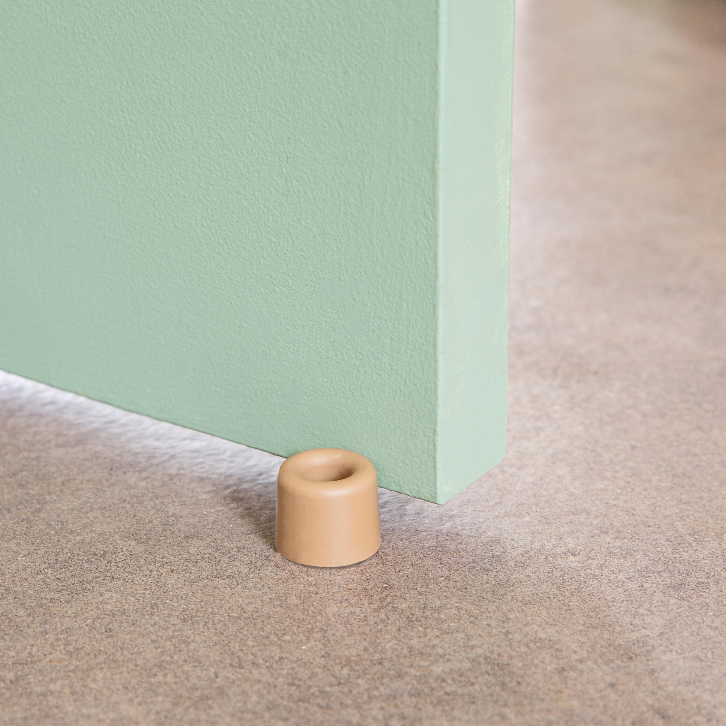 VULCANISED RUBBER DOORSTOP WITH DOUBLE FASTENING MATT BROWN D 3 X H 2.5 CM