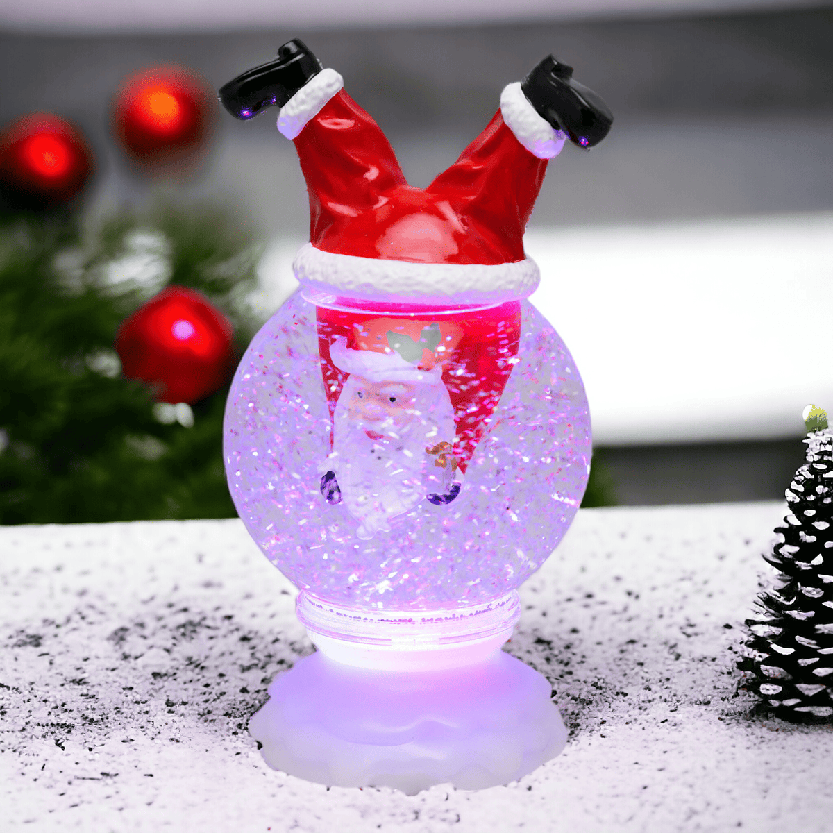 Sfera in vetro d11xh21cm con babbo natale capovolto, led multi rgb, movimento acqua e glit