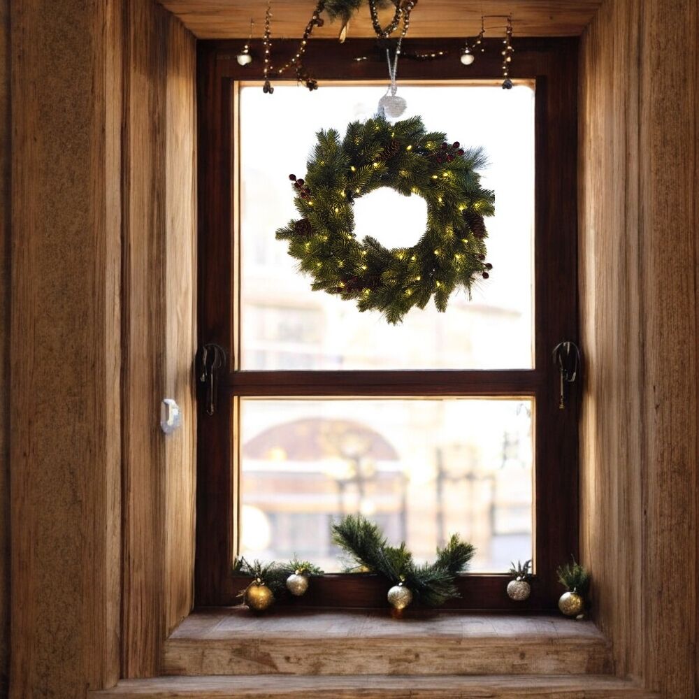 Corona luminosa con 120 rami, decori pigne e ribes, 4 dischi porta candela, 50 led luce bi