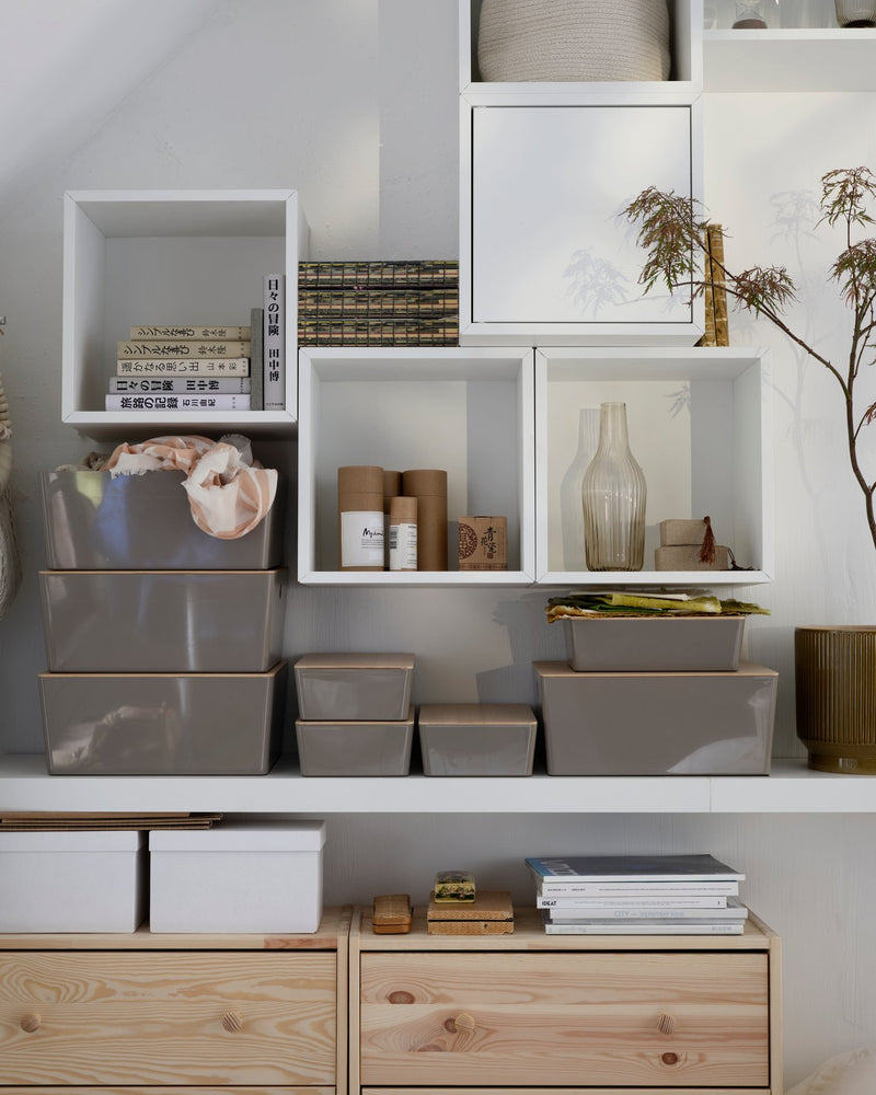 A EKET white modular structure used as a office storage.