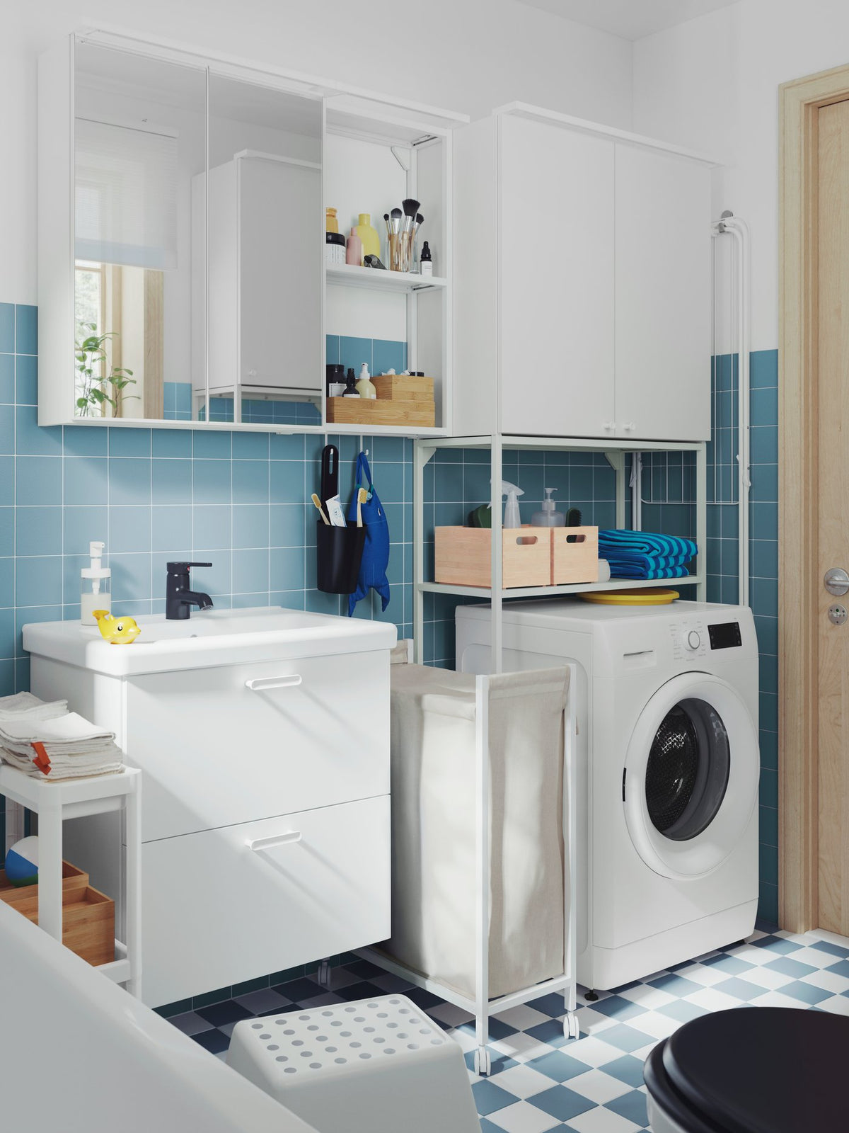 A fresh white and blue bathroom-laundry combination