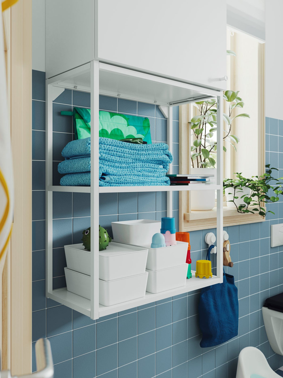 A fresh white and blue bathroom-laundry combination