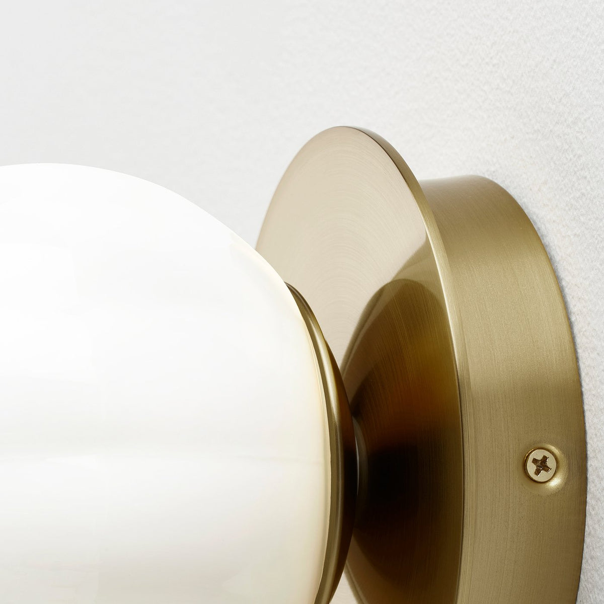 AKTERSPRING wall lamp, wired-in installation, opal white glass/brass-plated, 15 cm
