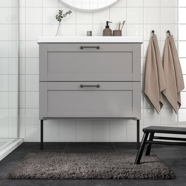 ALMTJÄRN - Bath mat, beige, 60x90 cm