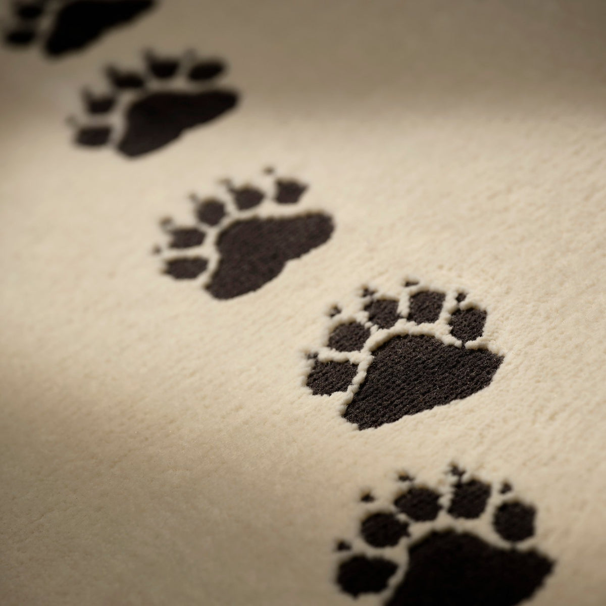 ALPTALL rug, beige/paw print pattern, 90x130 cm