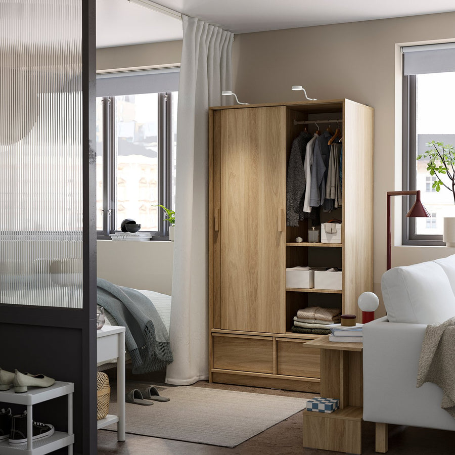 ANKARUDDEN wardrobe with sliding doors, oak effect, 98x60x190 cm