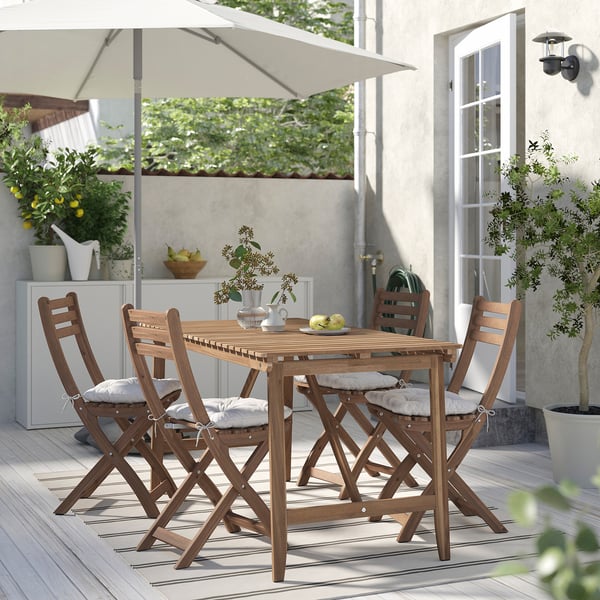ASKHOLMEN table+4 folding chairs, outdoor, dark brown/Kuddarna light grey-beige, 143x75 cm