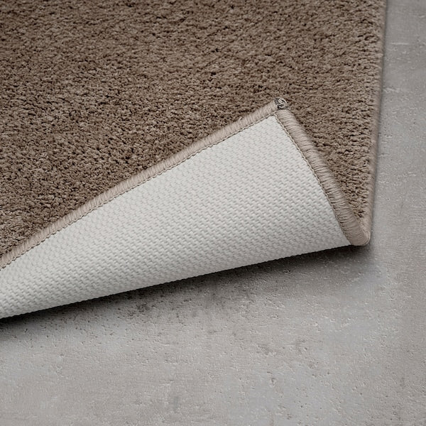 BACKMÅRA bath mat, beige, 50x80 cm