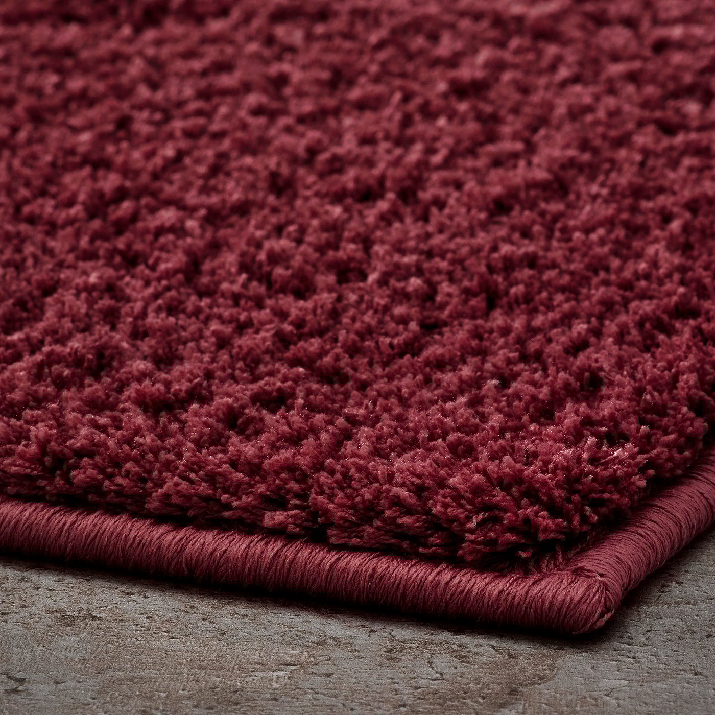 BACKMÅRA bath mat, deep red, 80x50 cm