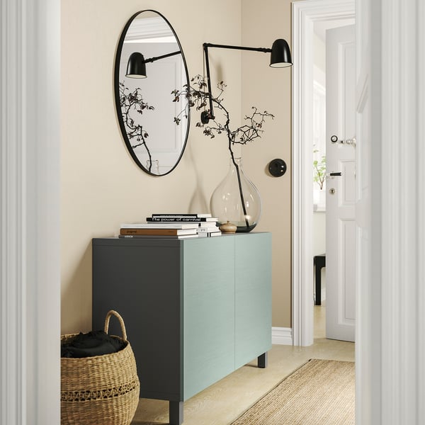 BESTÅ storage combination with doors, dark grey/Hjortviken/Stubbarp pale grey-green, 120x42x74 cm