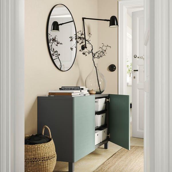 BESTÅ storage combination with doors, dark grey/Hjortviken/Stubbarp pale grey-green, 120x42x74 cm