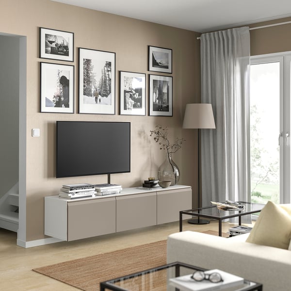 BESTÅ - BESTÅ TV bench with doors, white/Hammarsmed beige, 180x42x38 cm