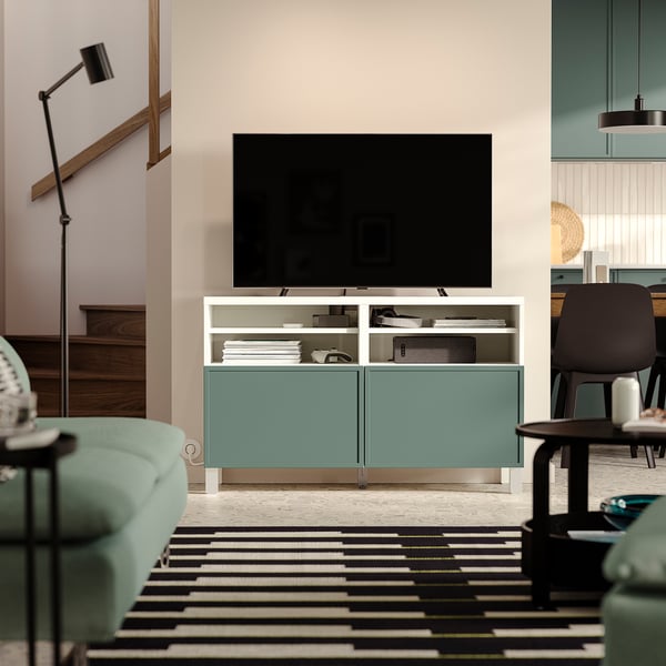 BESTÅ TV bench with doors, white/Krukmakare dark grey-green, 120x42x74 cm