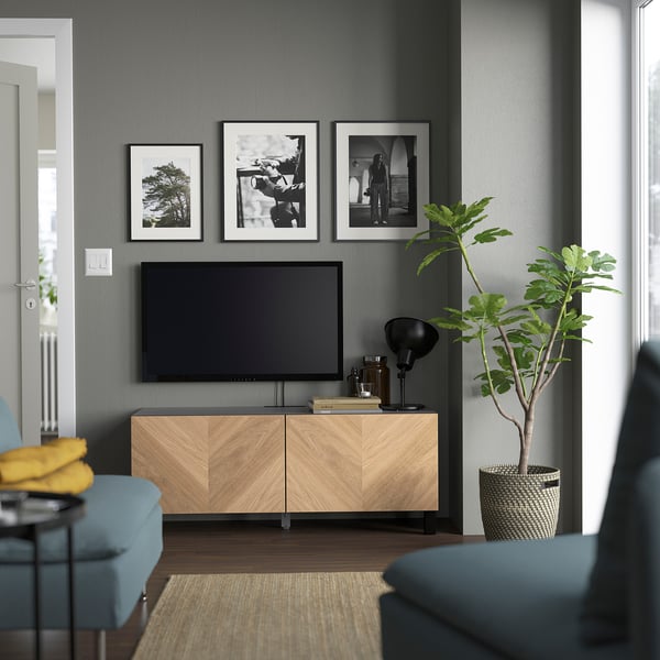 BESTÅ - TV bench with doors, black-brown/Hedeviken/Stubbarp oak veneer, 120x42x48 cm