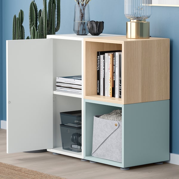 EKET - Cabinet combination with feet, white/stained oak effect light grey-blue, 70x35x72 cm